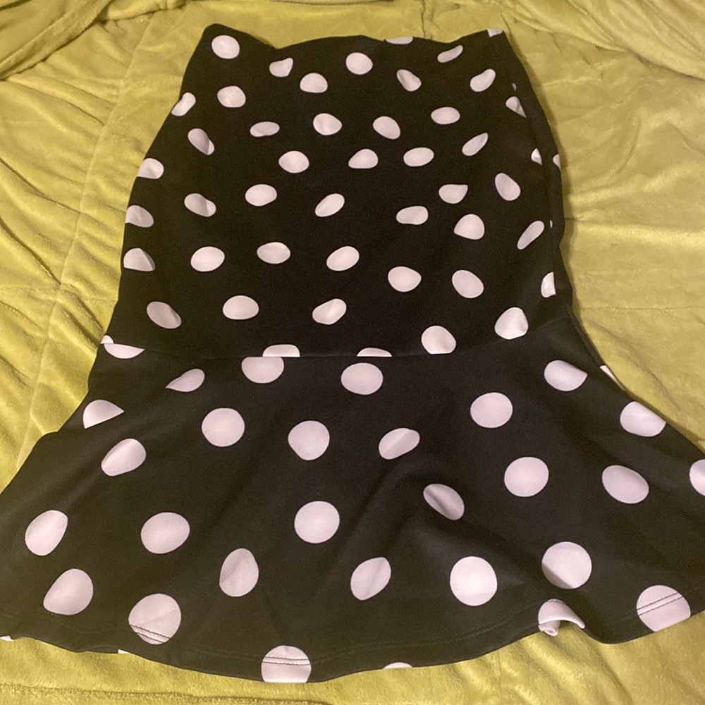 Long flare out skirt , with a black and white polka dot pattern worn once